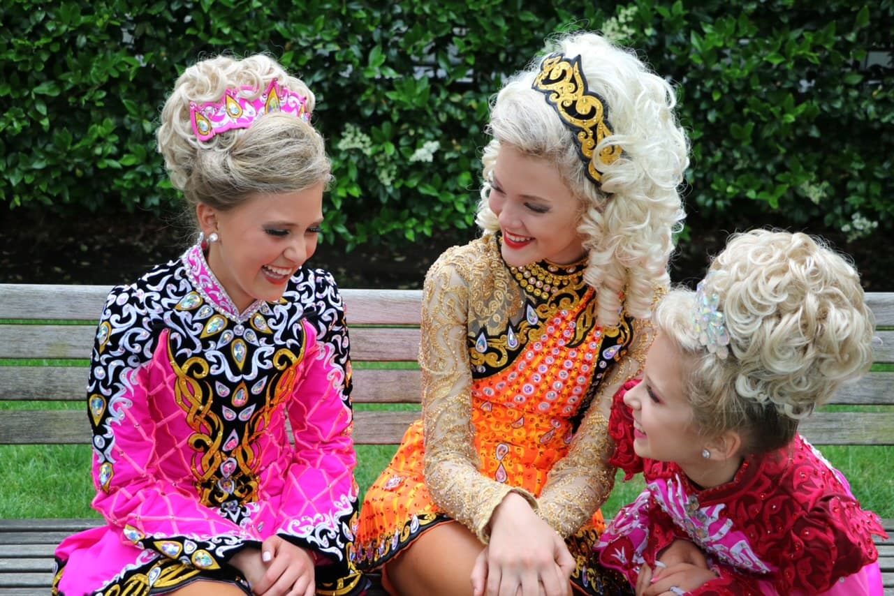Young Irish dancers sitting together